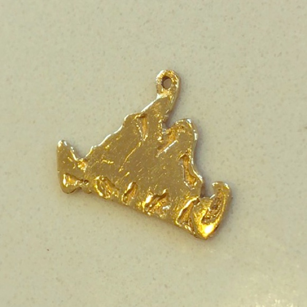 Gold 14k charm in the shape of Martha's Vineyard